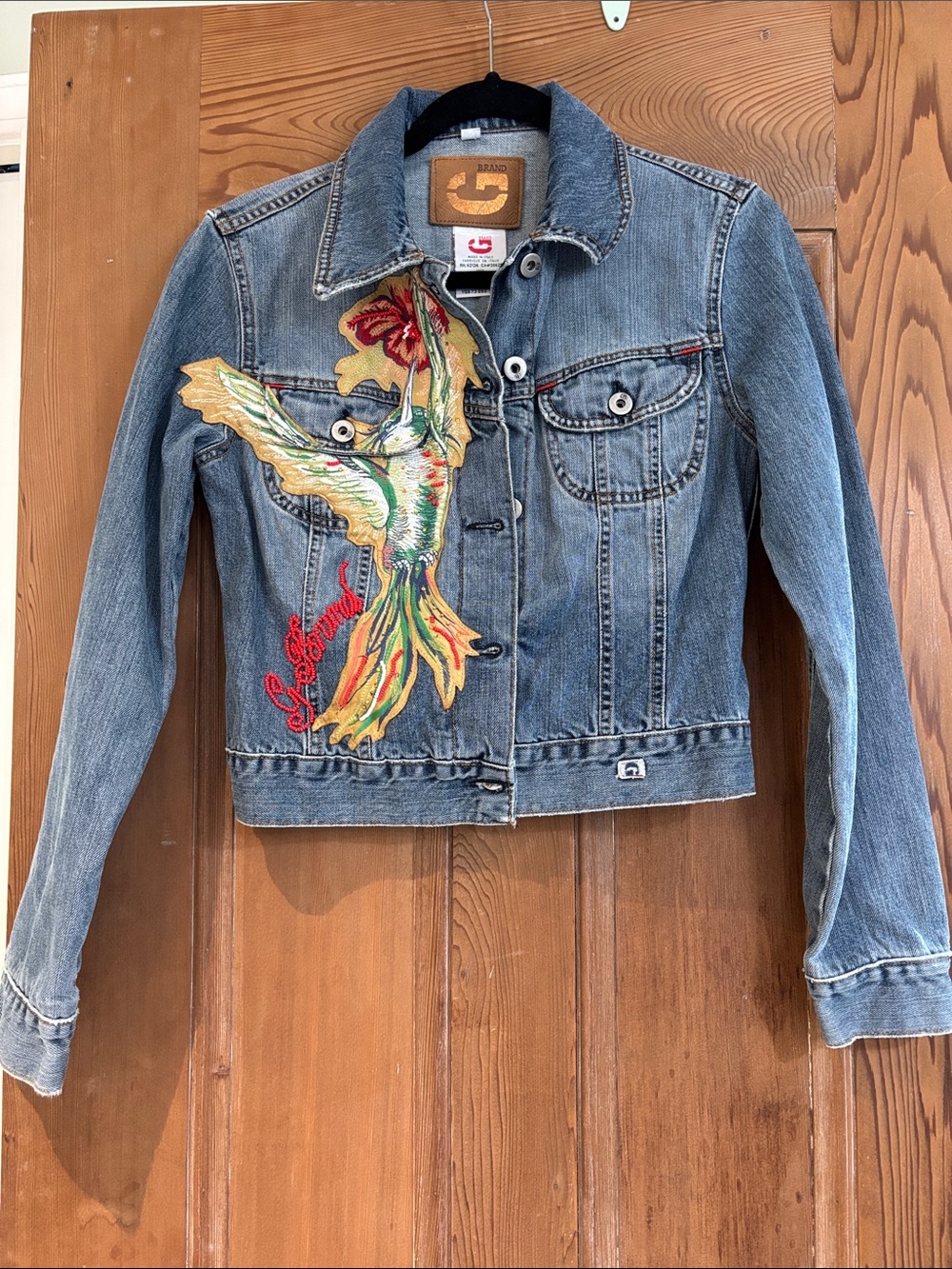 G Brand  Light Blue Denim Jacket with Multicolor Parrot Embroidery. Size Small